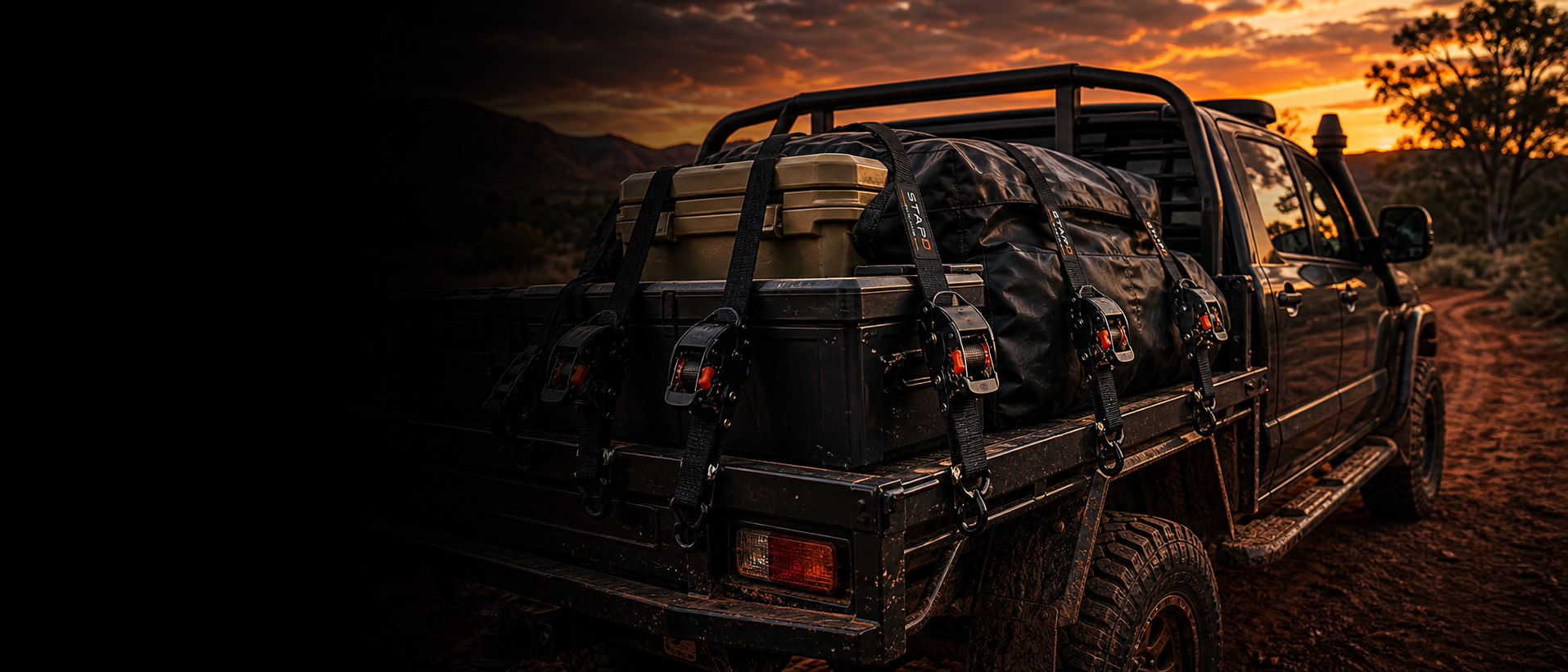 STRAPD retractable ratchet straps - loaded ute at sunset